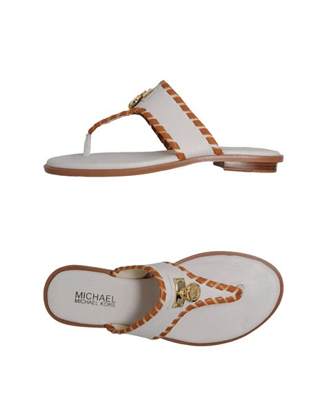 michael kors white flip flops.